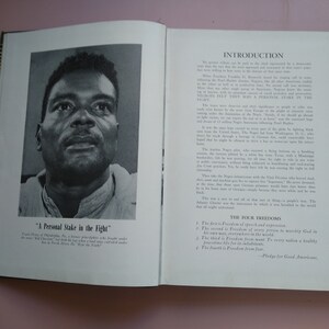 May include: A black and white photograph of a man with a serious expression. The caption reads "A Personal Stake in the Fight".