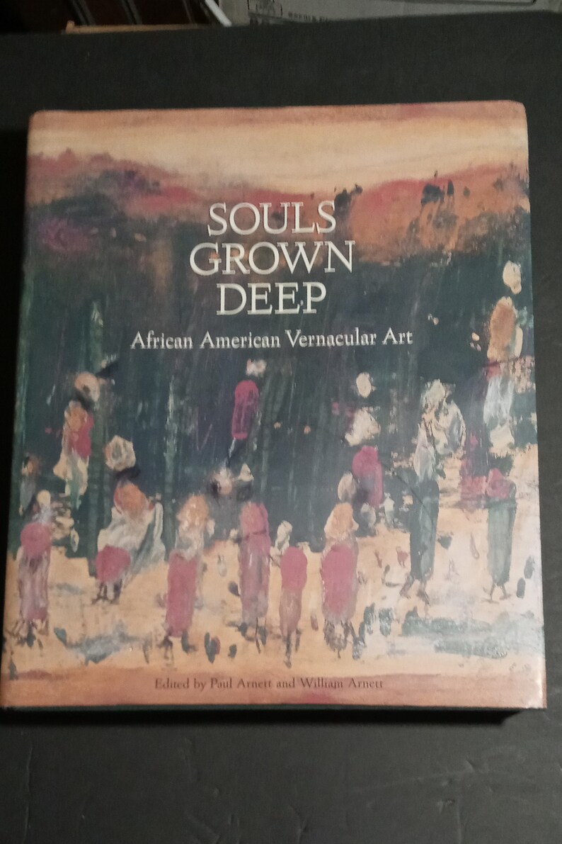 May include: Book cover with a painting of a group of people in a forest. The title of the book is "Souls Grown Deep: African American Vernacular Art".