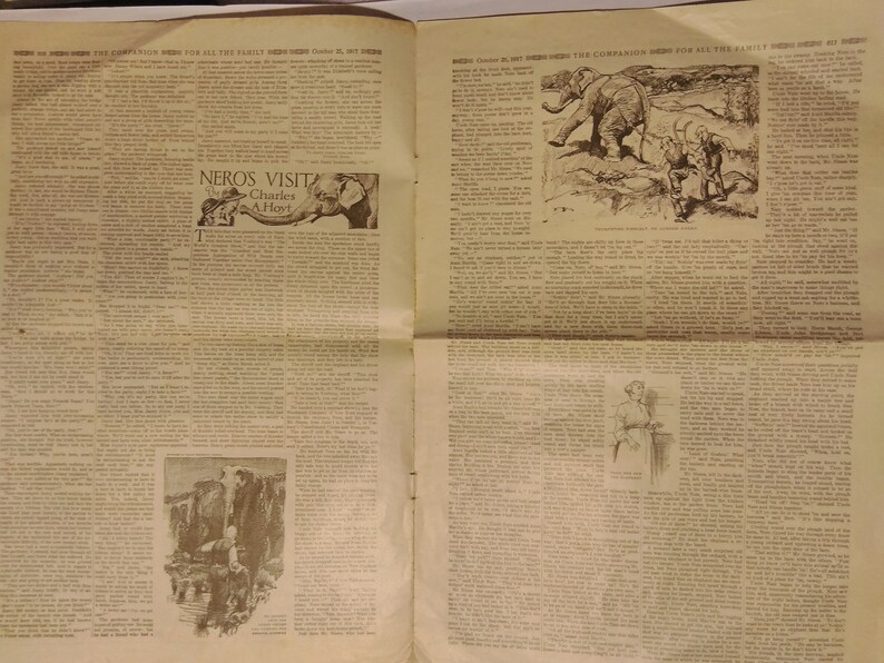 May include: A black and white newspaper page with text and illustrations. The text includes the title "The Companion for All the Family" and the date "October 26, 1897". The illustrations include a cartoon of an elephant, a woman in a dress, and a waterfall.