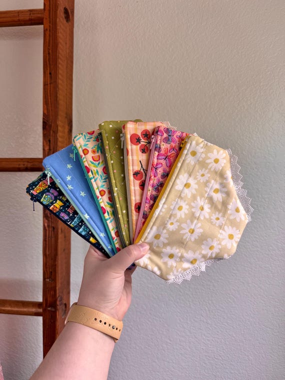 Quilted in the shape of underwear and actually functional as a pouch — the craft skill and the joke land simultaneously, which is rare.