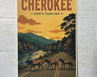 May include: A rectangular print featuring the text CHEROKEE NORTH CAROLINA at the top. The illustration depicts a group of elk crossing a road next to a river, with mountains in the background under a yellow and orange sunset sky.