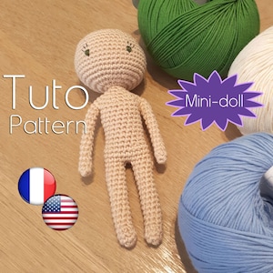 May include: A crocheted doll with a beige body and green eyes. The doll is surrounded by balls of yarn in green, white, and blue. The text "Tuto Pattern" and "Mini-doll" are visible in the image. The image also includes a French and American flag.