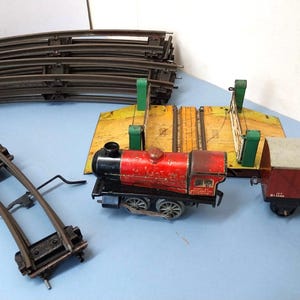 Vintage Hornby Tinplate Train, Wagon, Opening Gates crossing & Complete Large Circuit of Track. Wind up working.c1950s.O Guage Play worn.