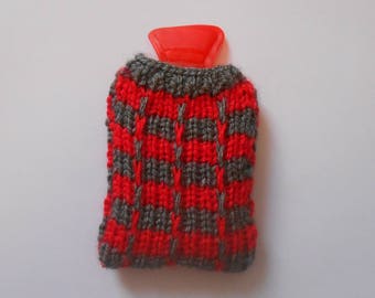 Water bottle pocket heater covered with handmade knitted cover