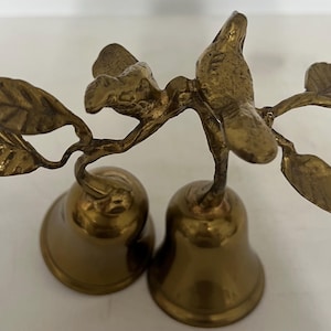 Vintage Double Brass Bells with Birds Resting on a Branch