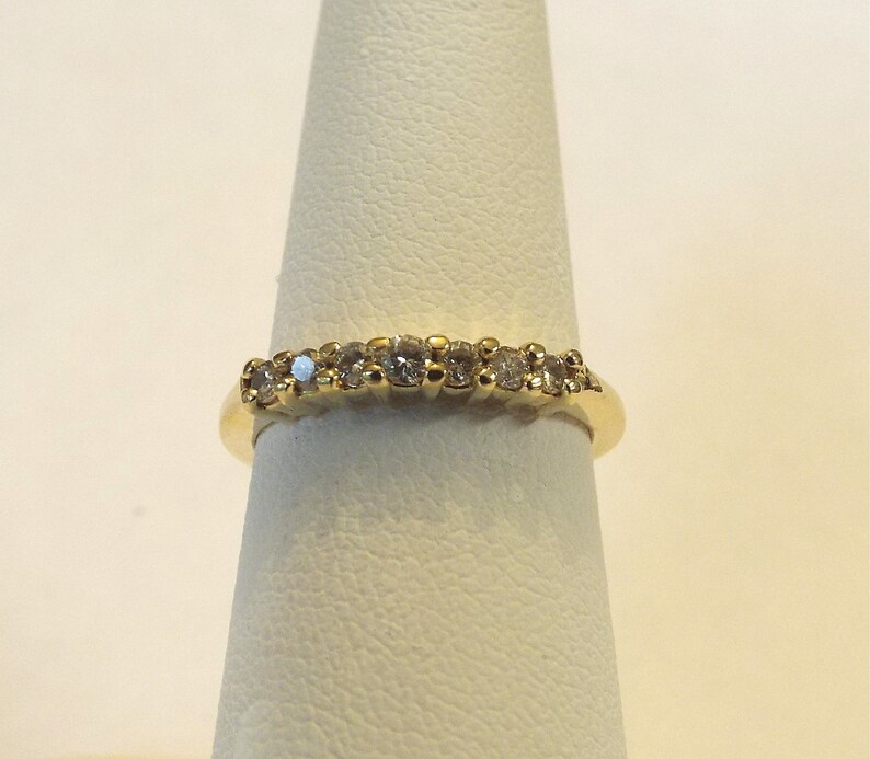 0.25 TCW Sparkley Ladies Diamond Straight Row Diamond Band,14k YG sz 6.5
