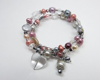 Memory wire bracelet, soft colors, heart charm and glass bead