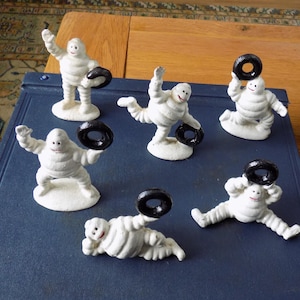 Set of 6 Cast Iron MICHELIN MEN Bibendum Ornaments Posing with Tyres