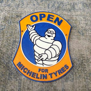 Open for MICHELIN TYRES Heavy Cast Iron Michelin Man Advertising Sign or Plaque