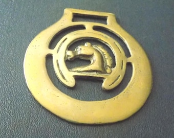 Antique cast HORSE BRASS Horses Head in Horseshoe Design