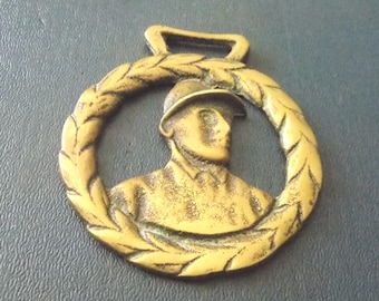 Antique cast HORSE BRASS featuring a JOCKEY " Fred Archer " Design Made in England