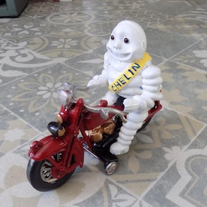 MICHELIN MAN on Red Harley Davidson Motorcycle painted Cast Iron Ornament