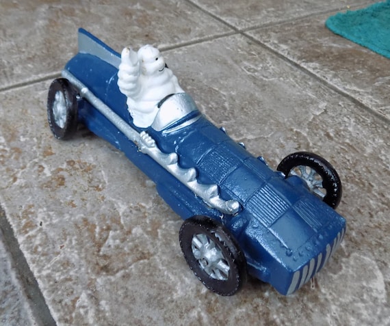 Michelin Man Bibendum Vintage Cast Iron Blue Race Car