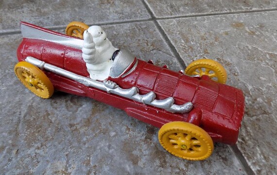 Michelin Man Bibendum Vintage Cast Iron Blue Race Car