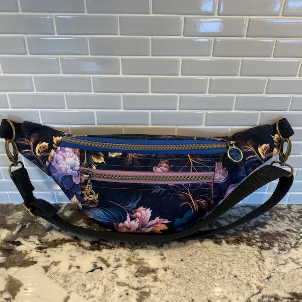 Ferris Fanny Pack full of fun and function. Two exterior zippered pockets. Night Peonies canvas fabric. Beautiful hardware and trim.