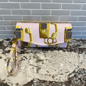 Clutch im Akkordeon-Stil mit 12 Kartenfächern, 1 Reißverschlussfach, 2 Einsteckfächern & Magnetverschluss. Tara Barr Recollect Canvas Stoff.