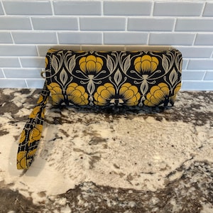 Clutch im Akkordeon-Stil mit 12 Kartenfächern, 1 Reißverschlussfach, 2 Einsteckfächern & Magnetverschluss. Roucoucou Canvas Stoff.