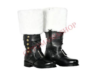 May include: A pair of black leather boots with white fur trim. The boots have a buckle closure and a gold button detail.