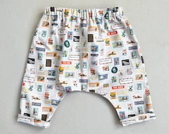 Cream 'World Traveller ' Print Cotton Trousers. Earthy Tones Baby.  Postcard Print. Unisex Baby Pants. Toddler Pants. Baby Trousers.