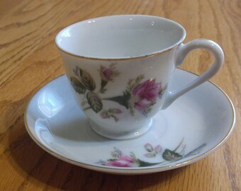 Vintage Tea Cup and Saucer with Red Floral Design