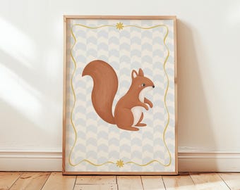 May include: A framed print featuring a cartoon squirrel. The squirrel is brown with a fluffy tail, set against a light blue and white patterned background. The frame is light brown, with a gold border and star accents.