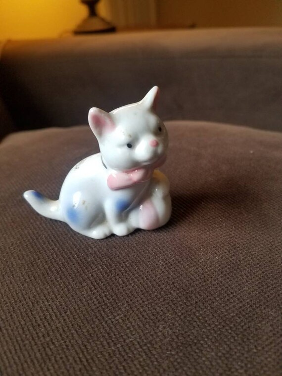 white cat with pink ears