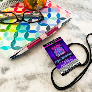 May include: A purple and neon pink party invitation in the shape of a 90s style ID badge with a black lanyard. The text reads "Back to 90s It's Jon's 30th Birthday!" with a date and time. The invitation also includes a ticket stub with the text "RSVP 123-4567 by 3/12 VIP All Access Pass".