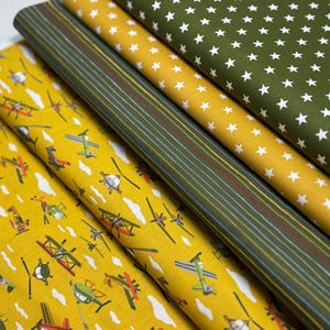 SALDI 1 m Tessuto per bambini Cotone Stelle Strisce Aeroplano Giallo Verde Curry