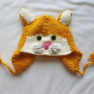 Kids Hand Knit Orange Kitty Cat Hat with Ear Flaps and Tassels image 1