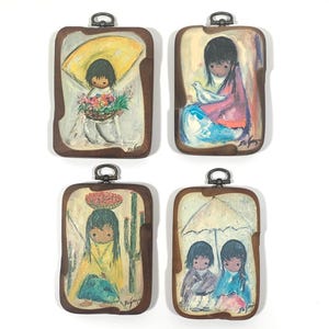May include: Set of four wooden framed paintings featuring colorful illustrations of girls in various scenes. The paintings are signed "Delgazo" and have a rustic, vintage aesthetic.