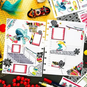 May include: A colorful planner with a skateboard theme. The planner has a black and white checkered background with a variety of stickers, including a skateboarder, a skateboard, and a flower. The planner also has a section for writing notes and a section for scheduling appointments. The text "Fear the regret not the fall" is visible on the planner.