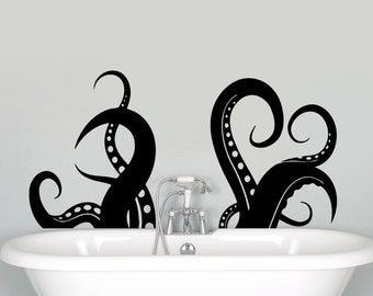 May include: A white bathtub with black octopus tentacles on the wall behind it.