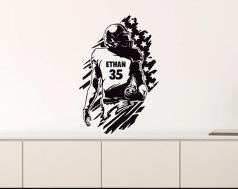 May include: Black and white silhouette of a football player wearing a jersey with the name "ETHAN" and the number "35" on it. The player is standing in front of a stylised American flag.
