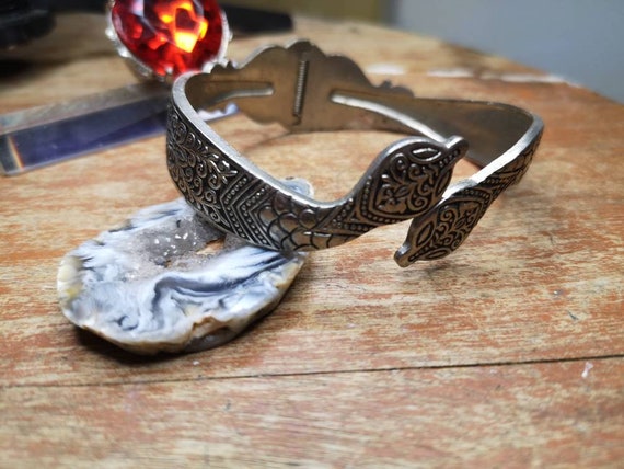 silver metal bracelet with agate sprig