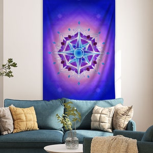 May include: A tapestry featuring a blue and purple mandala with a white starburst design and pink and purple accents. The mandala is surrounded by a blue background with a gradient effect.
