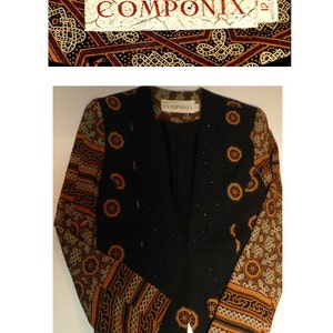 May include: A black blazer with a geometric pattern on the sleeves. The blazer has a label that reads "Marsha Brander for Componix 12 Made in Korea".