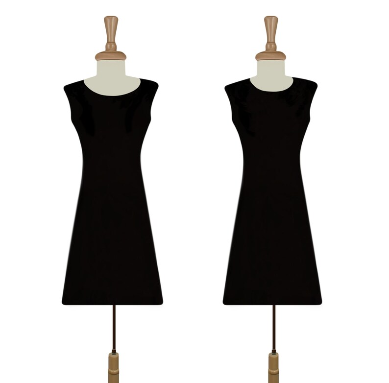 May include: Two black sleeveless dresses on mannequins with wooden heads and bases.