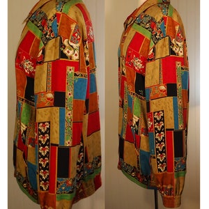 May include: A long-sleeved button-up shirt with a patchwork design featuring various colors and patterns, including red, blue, green, black, and gold.