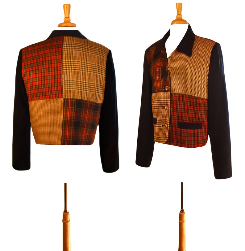 May include: A cropped jacket with a patchwork design. The jacket is made of four different plaid fabrics in shades of red, black, brown, and tan. The jacket has a navy blue collar and cuffs.