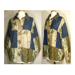 May include: A patchwork jacket with a button-up front. The jacket is made of different fabrics in shades of green, blue, and beige. The fabric has floral and geometric patterns.