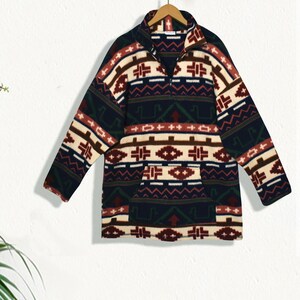 May include: A blue, white, red, and green patterned fleece pullover with a zipper closure. The pullover has a pocket on the front.