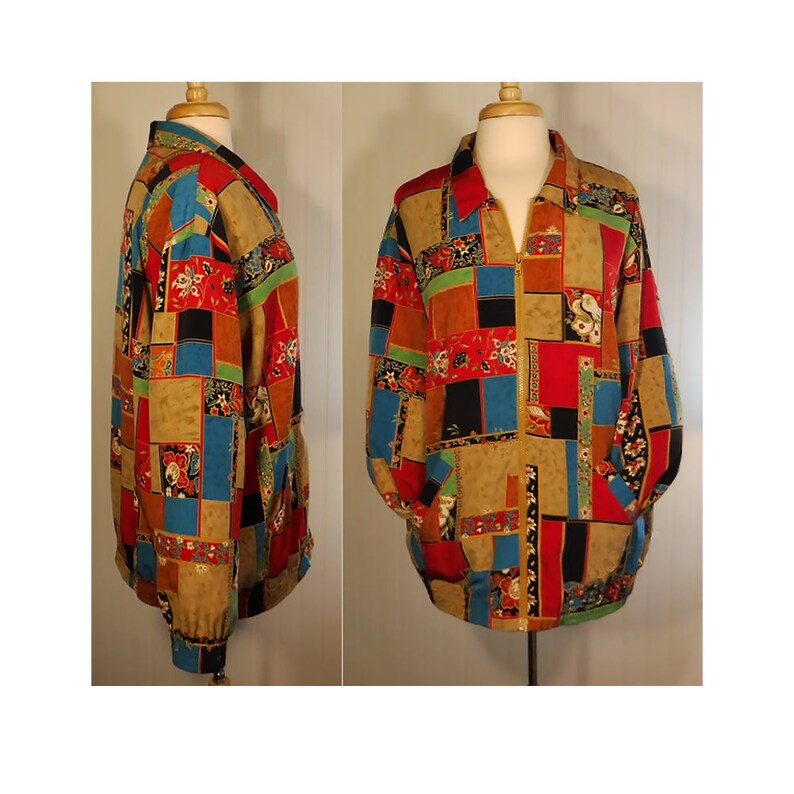 May include: A colorful patchwork jacket with a zipper closure. The jacket features a variety of geometric shapes and floral patterns in shades of red, blue, green, black, and brown.