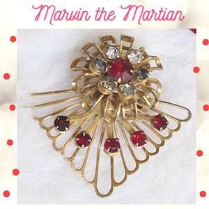 Vintage Gold Tone Red Rhinestone Brooch: Riveted Crystal Flower