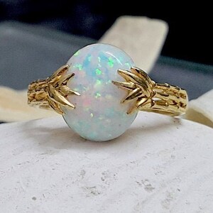 White opal ring, oval opal, delicate ring, gold ring, gemstone ring, bezel setting, opal jewelry ,wedding ring