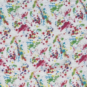 Tela tejida 100% lino de 5 oz con estampado de salpicaduras de pintura blanca, cortada a medida.