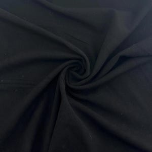 Tecido de malha jersey preto com elastano e bambu, vendido por metro (60 polegadas).