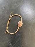 Fissurella Nodosa Shell Bracelet | Hand-Knotted Waxed Cord Beach Jewelry product logo