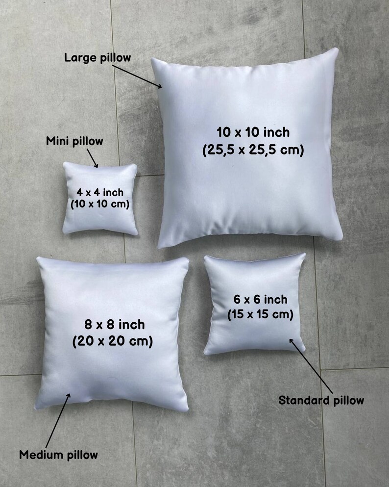 May include: Four white pillowcases of different sizes, labeled with their dimensions in inches and centimeters. The pillowcases are arranged from smallest to largest, with the smallest pillowcase labeled "Mini pillow" and the largest pillowcase labeled "Large pillow".