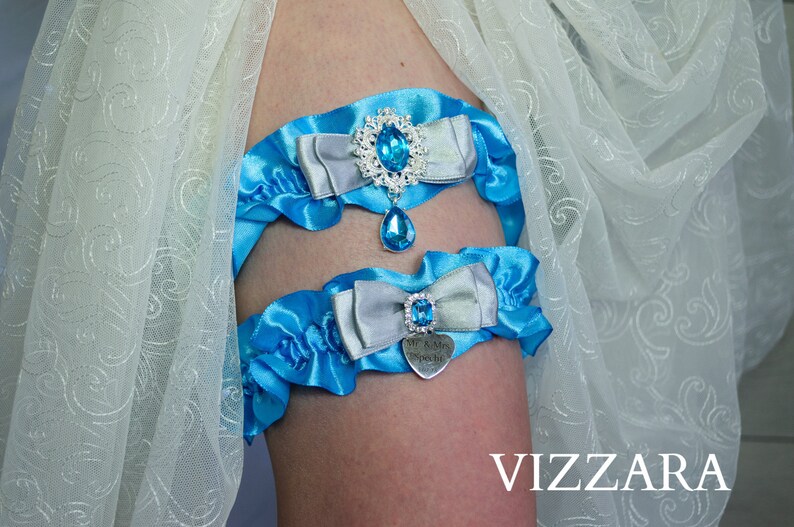 Wedding garter sets Turquoise and grey wedding Garters wedding Turquoise wedding ideas Garter sets for wedding Turquoise wedding colours