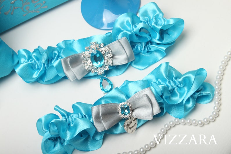 Wedding garter sets Turquoise and grey wedding Garters wedding Turquoise wedding ideas Garter sets for wedding Turquoise wedding colours